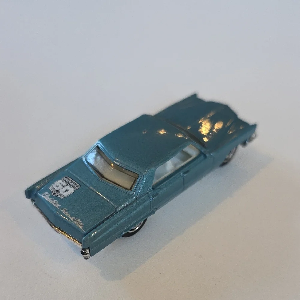 60th Anniversary Hot Wheels Cadillac Sedan DeVille '69 Diecast Car Model